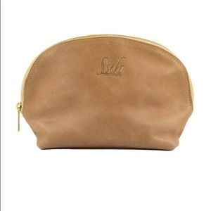 Leather cosmetic clutch